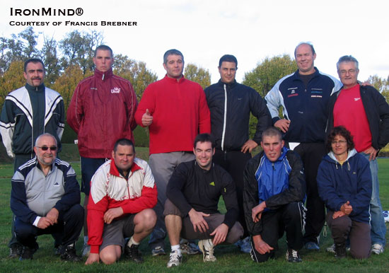 Wout Zijlstra (back row, second from right) lead a Highland Games training session in France today, organized by Jean-Louis Coppet (back row, far right), as part of his program to build the sport in his country.  IronMind® | Photo courtesy of Francis Brebner.