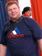 Former WSM competitor and top powerlifter Hjalti Arnason relaxes at the 2004 Arnold Expo, where he was on hand for the strongman competition. IronMind® | Randall J. Strossen, Ph.D. photo.