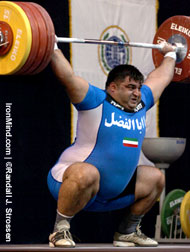 We call him the King of the Jungle: Two-time Olympic gold medalist Hossein Rezazadeh (Iran) holds all three world records in the super heavyweight category, so for him, snatching this 210 kg at the 2005 World Weightlifting Championships (Doha, Qatar) was just another day in the office. IronMind® | Randall J. Strossen, Ph.D. photo.