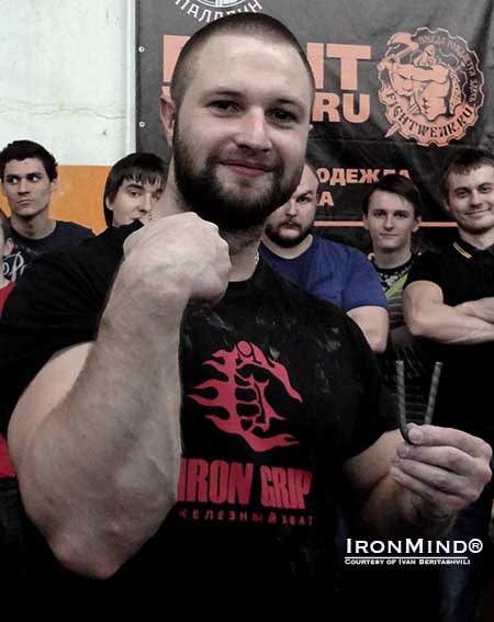 Not content to stop with certifying on the Red Nail, Ivan Beritashvili told IronMind, “My training goal in short steel bending is deformation [of the] Red Nail to past 40 degrees in reverse technique barehanded.”  IronMind® | Photo courtesy of Ivan Beritashvili
