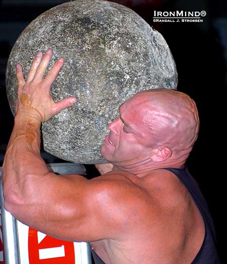 The Jon Andersen might be best known as a professional wrestler, but he was a formidable strongman competitor, too, and his trademark skull was the envy of shar peis worldwide, especially as it struck fear in the heart of big stones.  Here, Jon unloads on  the Atlas Stones at the 2004 World Muscle Power Championships, where he competed in a world class field that included  Zydrunas Savickas, Magnus Samuelsson, Mariusz Pudzianowski, Vasyl Virastyuk, Raimonds Bergmanis, Jessen Paulin, Mark Philippi, Rene Minkwitz, Dominic Filiou, Geoffrey Dolan and Hugo Girard.  IronMind® | Randall J. Strossen photo.