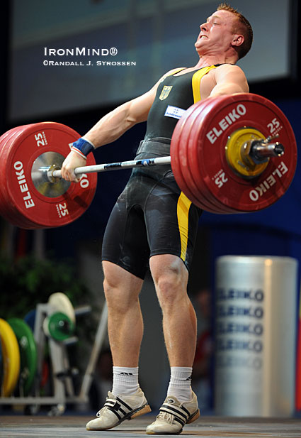 Juergen Spiess (Germany) - shown ripping this 178-kg snatch in the 94-kg category at the 2009 European Weightlifting Championships - is a product of training that includes plenty of doubles, not just limit singles, and this is one of the reasons why his one-rep max is so high.  IronMind® | Randall J. Strossen photo.  