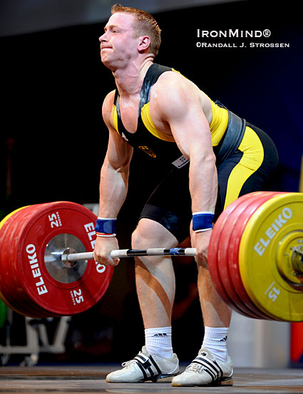 Studying Juergen Spiess (Germany), midway through a clean at the 2009 European Weightlifting Championships (where he won the 94-kg class), illustrates how the clean deadlift and shrug can benefit Olympic-style weightlifters, among others.  IronMind® | Randall J. Strossen photo.