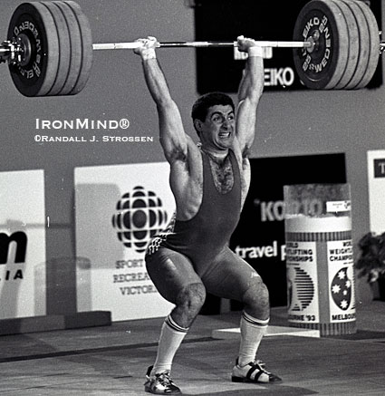 Pounding out a 222.5 clean and jerk at the 1993 World Weightlifting Championships, Kakhi Kakhiashvili displays his trademark power jerk. IronMind® | Randall J. Strossen photo. Pounding out a 222.5 clean and jerk at the 1993 World Weightlifting Championships, Kakhi Kakhiashvili displays his trademark power jerk. IronMind® | Randall J. Strossen photo.