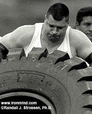 Karl Gillingham, whose consistency puts him head and shoulders above the crowd, gives it to the tire at the 1999 Beauty and the Beast strongman contest (Honolulu, Hawaii). IronMind® | Randall J. Strossen, Ph.D. photo.