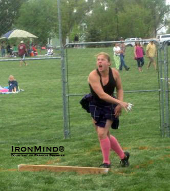 Kate Burton, hot off breaking the world record in the 14-lb. weight for distance, will be competing at the IHGF Women’s Highland Games Team Championships.  IronMind® | Courtesy of Francis Brebner.