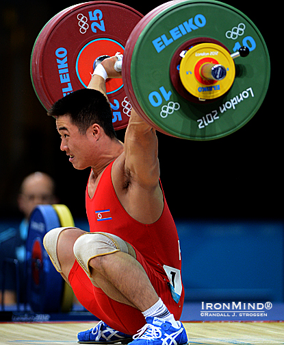 This rock bottom 153-kg snatch gave weightlifter Kim Un Guk (North Korea) an Olympic record plus a commanding lead in the men’s 62-kg category at the Olympics today—a lead that he turned into a gold medal.  IronMind® | Randall J. Strossen photo.