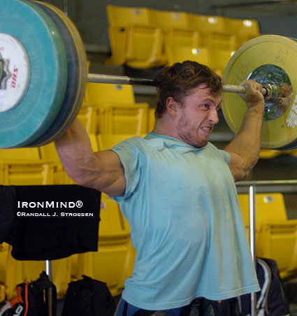 Dmitry Klokov combined squat snatches and presses behind the neck in the training hall at the 2007 World Weightlifting Championships (Chiang Mai, Thailand).  IronMind® | Randall J. Strossen photo.