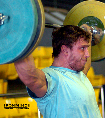 Dmitry Klokov, likely to be lifting for Russia in the 105-kg category at the London Olympics, knocks off some squat snatch-push presses behind the neck combinations in the training hall at the 2007 World Weightlifting Championships.  IronMind® | Randall J. Strossen photo.