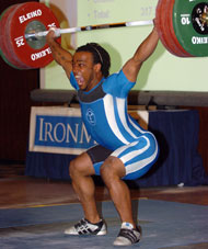 Lance Frye on his way up with his 150-kg snatch, which gave him a solid lead in the men's 77-kg category. IronMind® | Randall J. Strossen, Ph.D. photo.