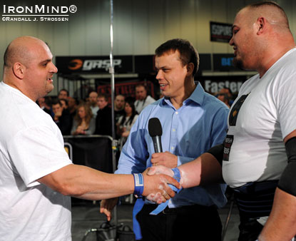Shown flanked by Laurence Shahlaei (left) and Brian Shaw (right), Giants Live director Colin Bryce is never far from the center of the action in strongman.  Laurence and Brian were minutes away from tying at 430-kg in the strongman deadlift at Giant Live–London earlier this year.  IronMind® | Randall J. Strossen photo.