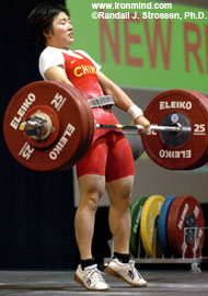 Li Ping (China) finishing the pull on her 126-kg clean and jerk at the World Weightifting Championships today. IronMind® | Randall J. Strossen, Ph.D. photo.