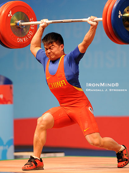 Long Qingquan missed the jerk on this 169-kg attempt - had he made it, the lift would have been good for one senior and two junior world records.  IronMind® | Randall J. Strossen photo.