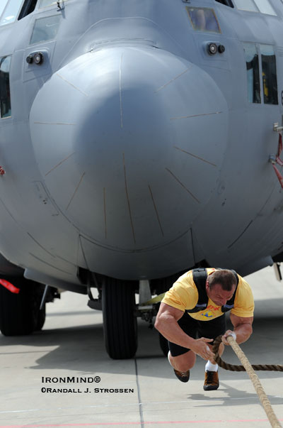 Mariusz Pudzianowski was just plain faster than the rest of the field when it came to pulling this C-130 Hercules. IronMind® | Randall J. Strossen, Ph.D. photo. Mariusz Pudzianowski was just plain faster than the rest of the field when it came to pulling this C-130 Hercules. IronMind® | Randall J. Strossen, Ph.D. photo.