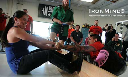 Irma Esquivel (left) versus Sonya del Gallego (right) at the Boss of Mas Wrestling Tournement held at Dan Green’s Boss Barbell Club in Mountain View, California.  IronMind® | Photo courtesy of Chip Conrad