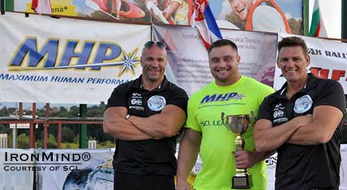 2013 MHP Strongman Champions League world champion Krzysztof Radzikowski (center), flanked by SCL directors Ilkka Kinnunen (left) and Marcel Mostert (right).  IronMind® | Image courtesy of SCL