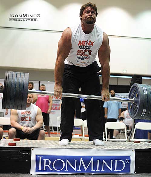 After demolishing the world record on the IronMind Apollon’s Axle Deadlift not once, but twice, Mike Burke pulled 240 kg to knee height, signaling where he’s planning to go with this lift.  In June, Burke will square off with the man whose world record he broke on this lift, the mighty Rich Williams.  IronMind® | Randall J. Strossen photo. 