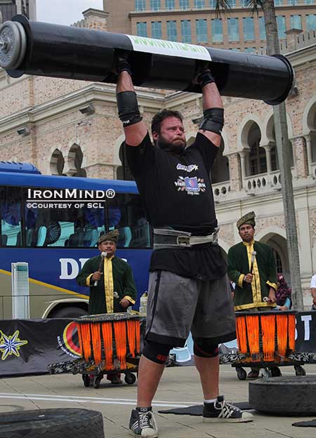 Mike Burke, shown on the Log Lift at the 2013 SCL Grand Finale in Kuala Lumpur, is headed to Shanghai.  IronMind® | Photo courtesy of SCL
