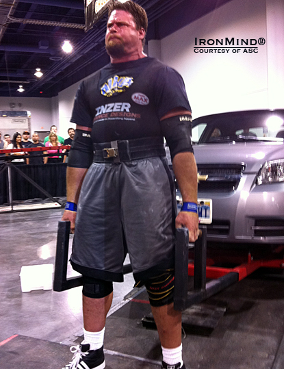 Mike Burke on the Car Deadlift for reps at the Olympia Strongest Man contest.  IronMind® | Courtesy of ASC.