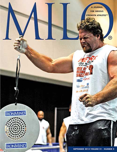 Mike Burke is the editor’s choice for having the world’s strongest grip—after all, he’s certified on the Captains of Crush No. 3.5 gripper and is the world record holder on the CoC Silver Bullet and the Apollon’s Axle Double Overhand Deadlift.  Not enough?  How about when he cleans a pair of Inch dumbbells and certifies on the Captains of Crush No. 4 gripper?  By the way, when Mike turned in a most impressive performance on the overhead medley at the World’s Strongest Man contest a couple of weeks ago, Bill Kazmaier said appreciatively to Randall Strossen, “That’s what happens when a man competes at World’s Strongest Man.”  IronMind® | Randall J. Strossen photo