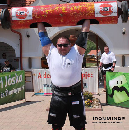 Ákos Nagy, second place in the 2012 Hungary’s Strongest Man contest, on the log lift.  IronMind® | Photo courtesy of Adam Darazs.