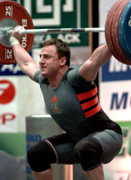Ruslan Novikau (Belarus) looked like he had this 172.5-kg snatch, but he lost it as he was recovering. IronMind® | Randall J. Strossen, Ph.D. photo.