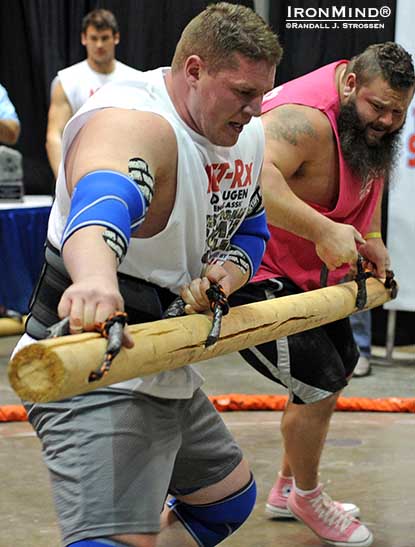 Strongman combat is what Odd Haugen called the mano a mano events he introduced at last weekend’s Los Angeles FitExpo, all of which were crowd favorites.  Here’s James Rude (left) goes at it with Robert “OB” Oberst (right) in the Pole Push.  OB won the Strongman Combat competition (James Rude was the runner-up), as well as the Overall title (best combined score across Strongman, Grip Strength and Strongman Combat).  IronMind® | Randall J. Strossen photo.