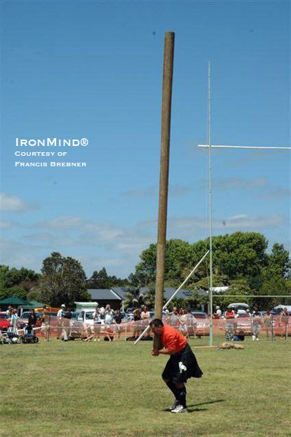 Pat Hellier on the caber.  IronMind® | Photo courtesy of Francis Brebner.