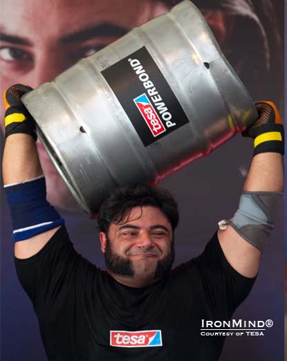 Patrik Baboumian hoisted a world record 150.2-kg, 50-l beer keg.  IronMind® | Photo courtesy of Tesa.