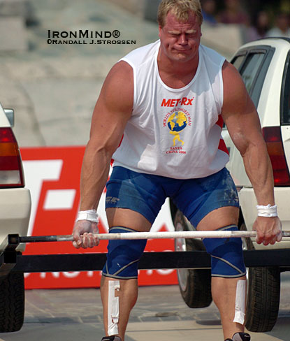 Supersized Phil Pfister, 2006 MET-Rx World’s Strongest Man winner, has the sort of frame and skill set that are well suited for the intense, all-around challenges posed by the WSM contest. Although some smaller guys have won the contest, the nature of its demands makes this contest the special domain of the truly big and strong—guys who can, for example, deadlift two cars for reps, on demand. IronMind® | Randall J. Strossen photo. Supersized Phil Pfister, 2006 MET-Rx World’s Strongest Man winner, has the sort of frame and skill set that are well suited for the intense, all-around challenges posed by the WSM contest. Although some smaller guys have won the contest, the nature of its demands makes this contest the special domain of the truly big and strong—guys who can, for example, deadlift two cars for reps, on demand. IronMind® | Randall J. Strossen photo.