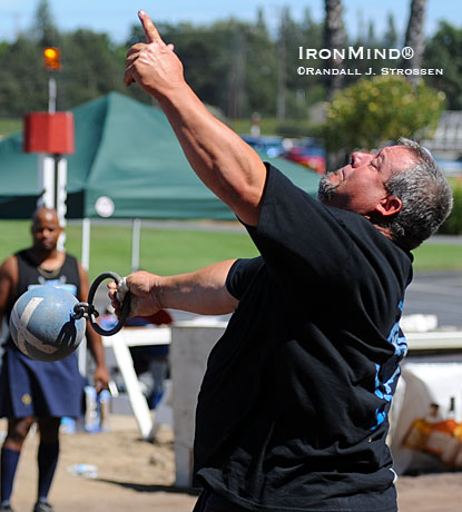 Ryan Vierra on the 56-lb. weight for height at the 2009 Pleasanton Highland Games.  IronMind® | Randall J. Strossen photo.