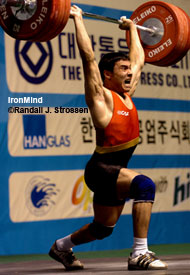 Growl power: Farhat Saidov stuck this 175-kg jerk at the Asian Junior Championships today in Gunsan, Korea. IronMind® | Randall J. Strossen, Ph.D. photo.