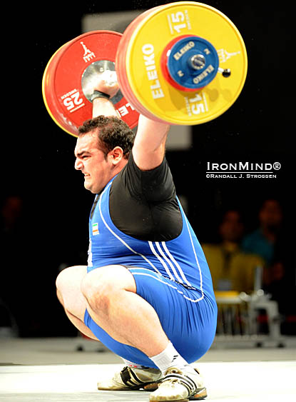 Behdad Salimi had recently snatched 217 kg in a small contest, so everyone knew the horsepower and the technique were there to break Hossein Rezazadeh’s longstanding world record in the snatch.  Salimi showed that his unofficial performances were no fluke as he sank the putt on this 214-kg snatch at the World Weightlifting Championshps, good for a new world record.  IronMind® | Randall J. Strossen photo.