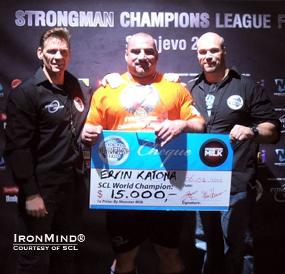 Ervin Katona (center) won the 2011 Strongman Champions League World Championships and received the US$15,000 Monster Milk–SCL check from SCL cofounders Marcel Mostert (left) and Ilkka Kinnunen (right).  IronMind® | Courtesy of  SCL.