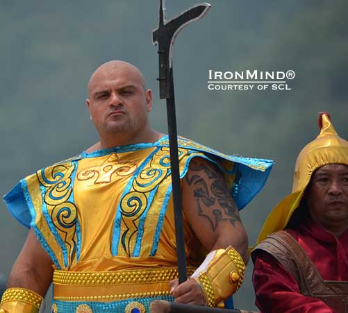Laurence Shahlaei, in gladatorial splendor, sets the tone for SCL–China.  Shahlaei was captain of the Blue Team, in a format unlike anything seen before in strongman in a contest of unrivaled scale and staging.  IronMind® | Courtesy of SCL.