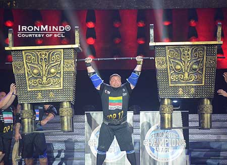 SCL–China: out of the 32 top strongman competitors who started, it came down to the final two, who dueled on the Jar Lift, an unwieldy overhead lift. Zydrunas Savickas won, taking home US$10,000 in the process. IronMind® | Photo courtesy of SCL. SCL–China: out of the 32 top strongman competitors who started, it came down to the final two, who dueled on the Jar Lift, an unwieldy overhead lift. Zydrunas Savickas won, taking home US$10,000 in the process. IronMind® | Photo courtesy of SCL.