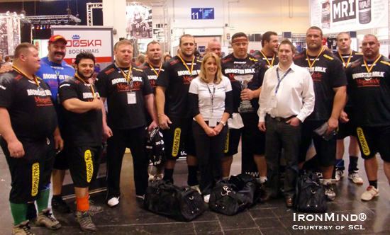Very happy with the SCL-FIBO strongman contest, Marcel Mostert told IronMind that he is aiming to be even bigger and better next year.  Wearing a blue shirt and a red cap, that's Heinz Ollesch in the back row on the left.  IronMind® | Photo courtesy of SCL.