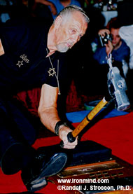 Getting ready to put the pedal to the metal, Slim "The Hammerman" Farman warms up at the 2003 AOBS dinner. IronMind® | Randall J. Strossen, Ph.D. photo.