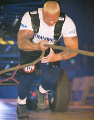 World's Strongest Man winner Svend "Viking Power" Karlsen lays into the truck pull at the 2003 Vantaa Grand Prix (Vantaa, Finland). IronMind® | Randall J. Strossen, Ph.D. photo.