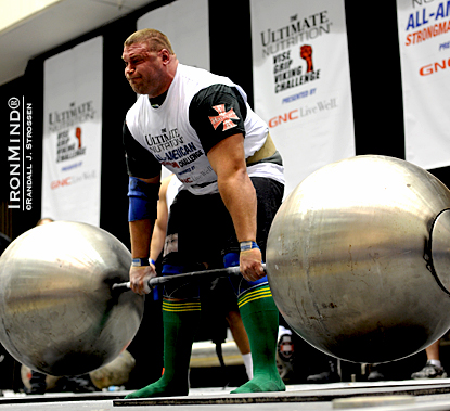 Terry Hollands pulls an easy 1025-lb. deadlift on the giant globe barbell at the LA FitExpo strongman contest.  IronMind® | Randall J. Strossen photo.