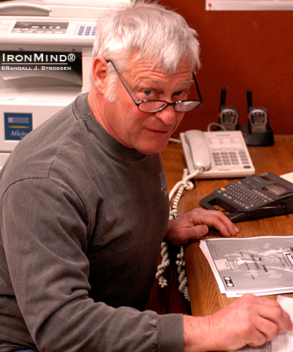 Inspired weightlifting coach Tom Hirtz takes care of some paperwork right before the 2007 IronWorks Open (Springfield, Oregon).  IronMind® | Randall J. Strossen photo.