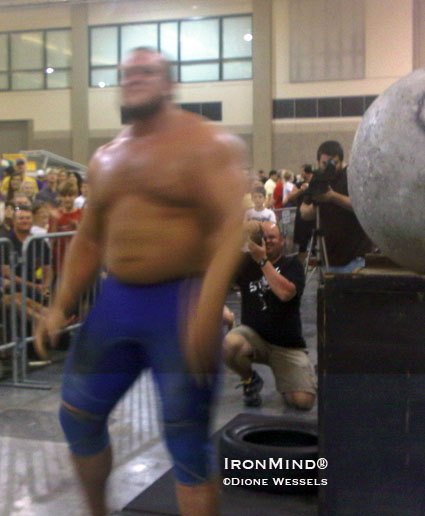 He’s a blur, but that’s Travis Ortmayer after loading five stones in what might be the fastest time ever for  a comparable series of strongman stones.  IronMind® | Dione Wessels photo.  