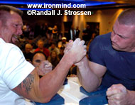 They might not be nuclear, but the arms sported by Rick Vardell (left) and Robbie Topie (right) at Boomtown last night could pump up the arsenals of a lot of smaller countries. IronMind® | Randall J. Strossen photo.