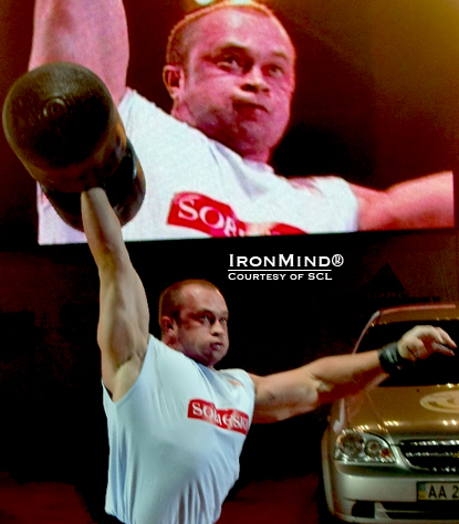 vVitaly Gerasimov broke the world record on the Circus Dumbbell at the 105-kg SCL 105-kg Strongman World Championships.  IronMind® | Photo courtesy of SCL.  