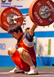 Low and solid, this 125-kg snatch gave Wang Wenquing the margin he needed to win the 62-kg category at the Asian Junior Weightlifting Championships today. IronMind® | Randall J. Strossen, Ph.D. photo.