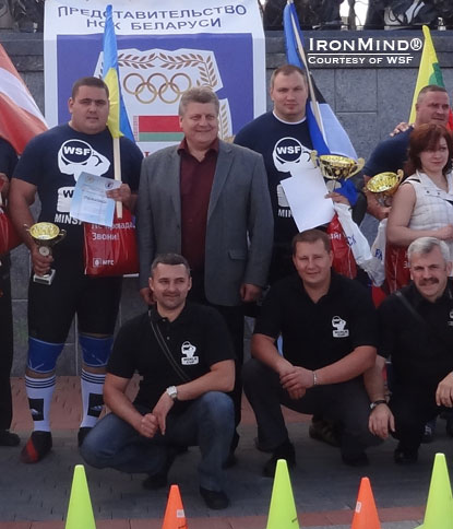 Leonid Taranenko (center) did the honors of opening the WSF–World Cup strongman contest in Minsk.  Taranenko’s mighty credits as a weightlifter include an Olympic gold medal and the highest official clean and jerk in history.  Taranenko is now the executive director of the Belarus National Olympic Committee office in Minsk, Redkin told IronMind.  IronMind® | Courtesy of WSF–World Cup.