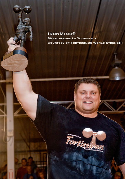 The proud winner of Fortissimus 2009, Zydrunas Savickas, displays his trophy.  IronMind® | Marc-Andre Le Tourneaux photo, courtesy of Fortissimus World Strength.