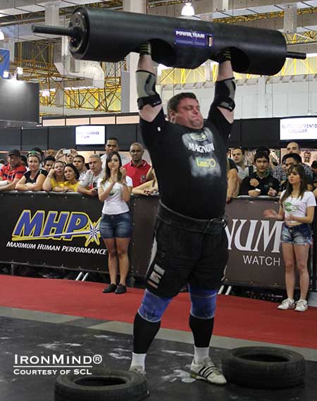 Zydrunas Savickas on the Log Lift for reps at the MHP Strongman Champions League competition held at the Expo Nutrition in Sao Paulo, Brazil.  IronMind® | Image courtesy of SCL