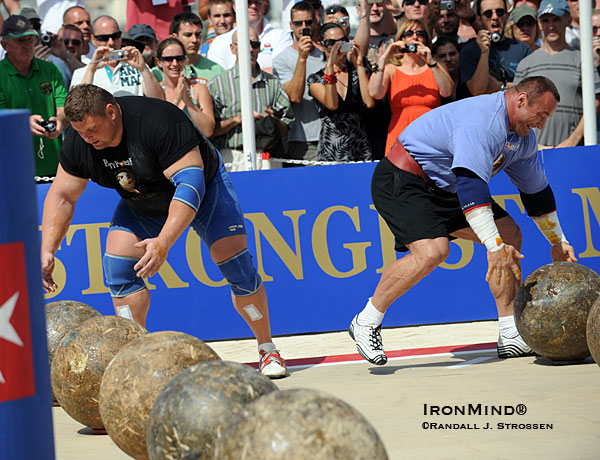 Zydrunas Savickas and Mariusz Pudzianowski in the last event at the 2009 World’s Strongest Man contest.  IronMind® | Randall J. Strossen photo.