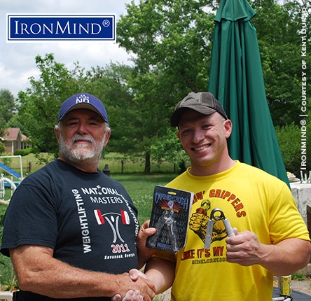 Gilbert Goodman (right) started by officially closing the Captains of Crush No. 3 gripper and from there, his referee, Kent Durso (left) served up everything from tires to stones to his never-before-been closed gripper. IronMind® | Photo courtesy of Kent Durso